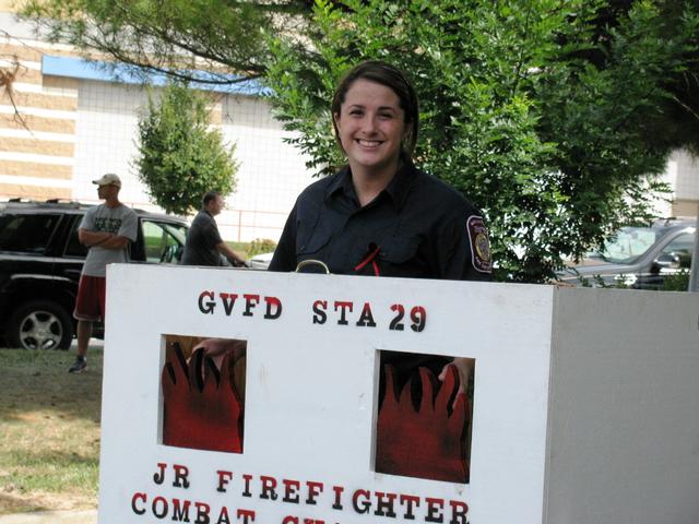 Probationary Member Karis helps out with the Jr. Firefighter Challenge