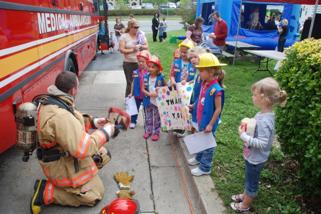 FF McHenry speaks to children about the &quot;friendly firefighter&quot;.