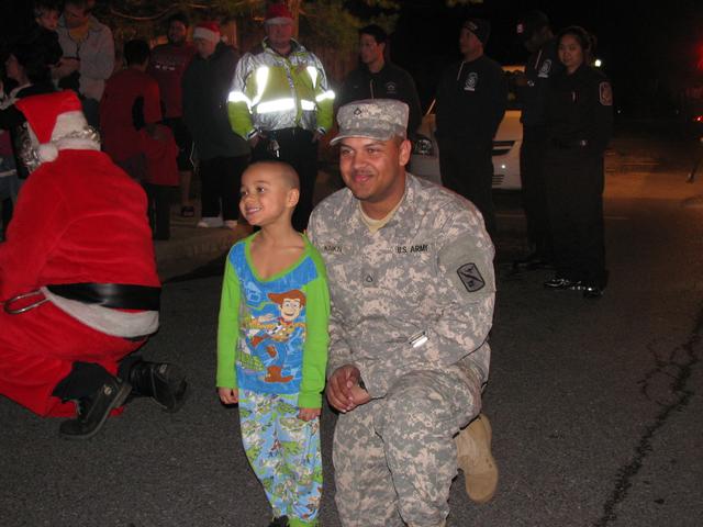 His wish was to have a picture taken with the soldier that was escorting Santa Claus.