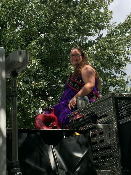 2013-2014  MCVFRA Miss Fire Prevention Ambassador Emily Moyers sits on top of E729B waiting for the 2014 Gaithersburg Labor Day Parade to start.